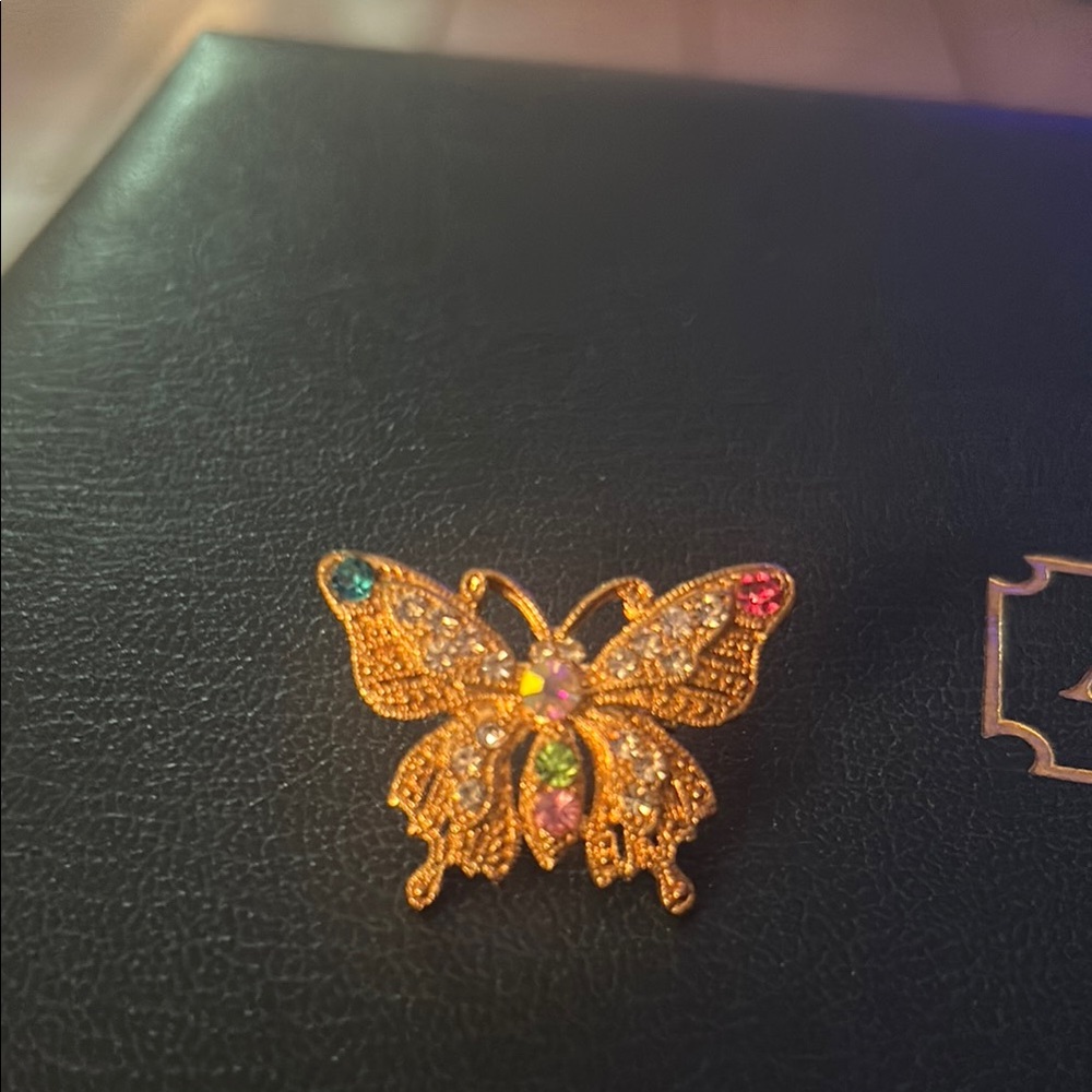 Elegant Gold Butterfly Brooch with Multicolor Accents